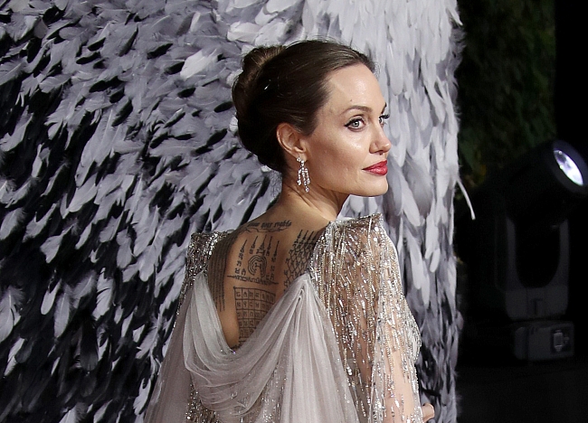 Что значат татуировки Анджелины Джоли, Дэвида Бекхэма, Джареда Лето и других звезд фото № 1