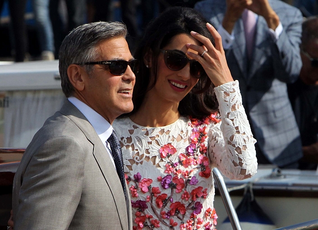 Джордж и Амаль Клуни в Венеции на следующий день после их свадьбы, 2014 год фото № 1